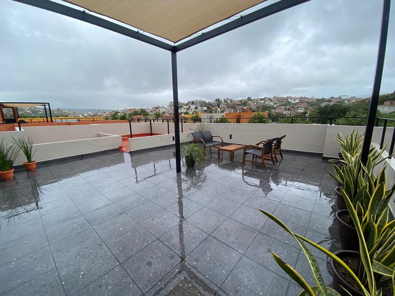 Modern Minimalist 2BR + Private Rooftop | Pool + Gym | Near Centro — 20 photos