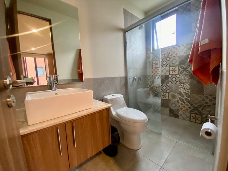 Modern Minimalist 2BR + Private Rooftop | Pool + Gym | Near Centro — 4 photos