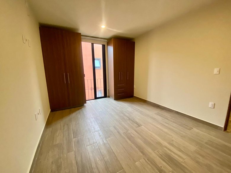 Modern Minimalist 2BR + Private Rooftop | Pool + Gym | Near Centro — 3 photos