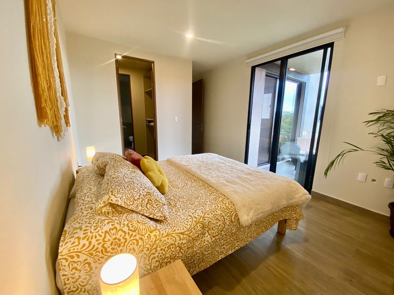 Modern Minimalist 2BR + Private Rooftop | Pool + Gym | Near Centro — 8 photos