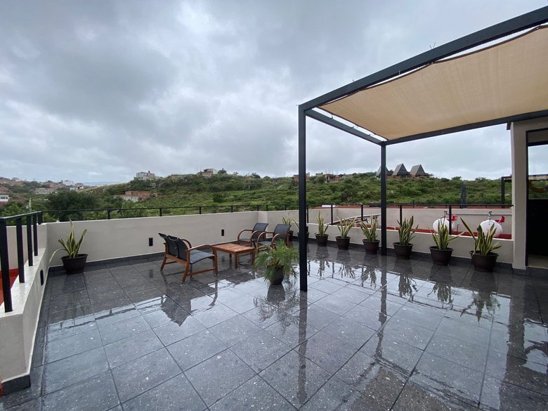Modern Minimalist 2BR + Private Rooftop | Pool + Gym | Near Centro — 21 photos
