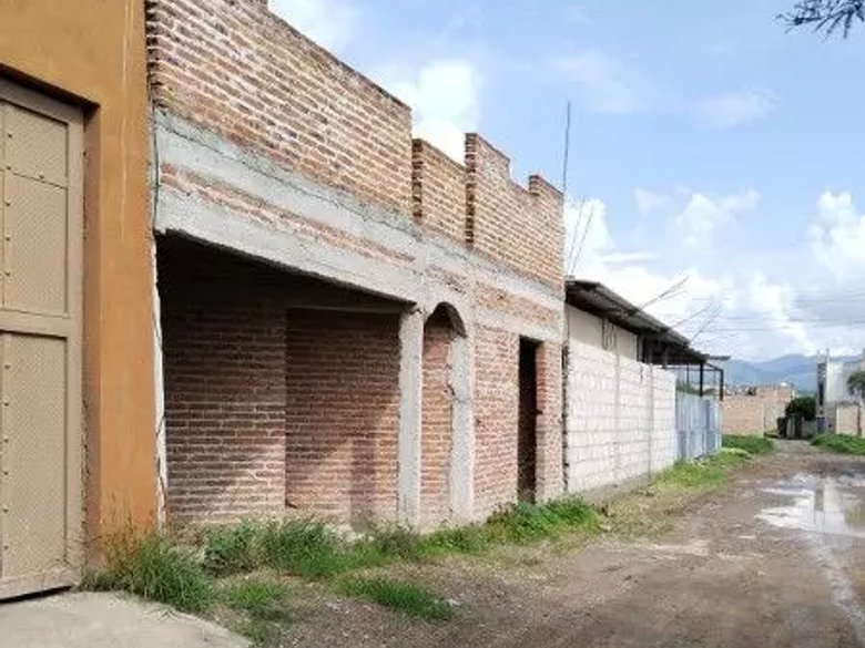 Lote y Construcción ALM — 2 photos