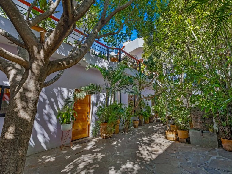 Casa Entre Arboles — 2 photos